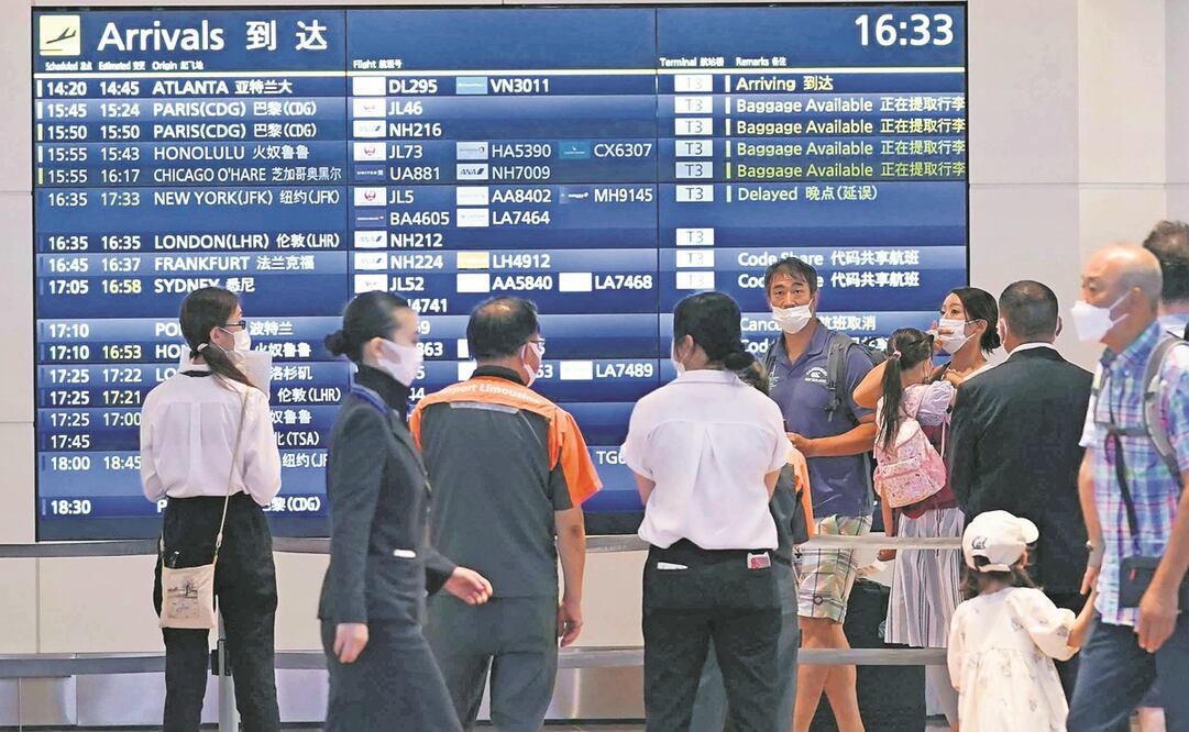 Pasajeros en el aeropuerto de Haneda en Tokio, el martes pasado.