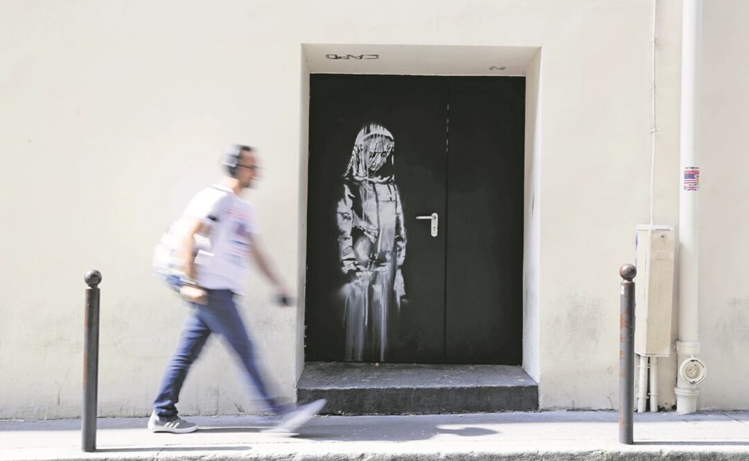 Obra de Banksy en París. Foto: AFP/Thomas SAMSON