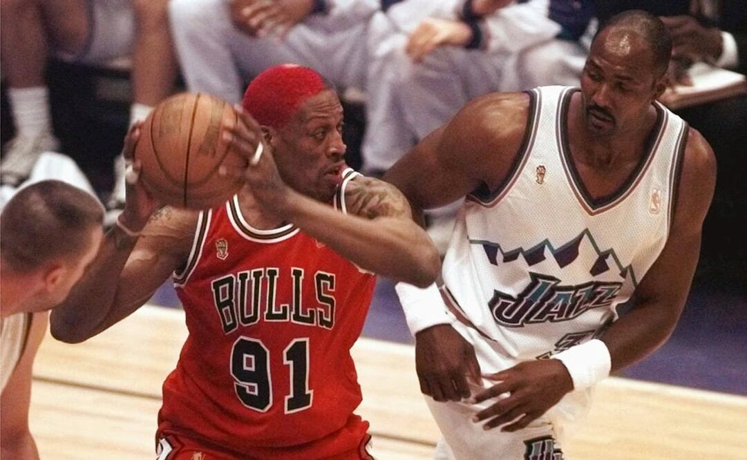 Dennis Rodman (Chicago Bulls) y Karl Malone (Utah Jazz) - AP