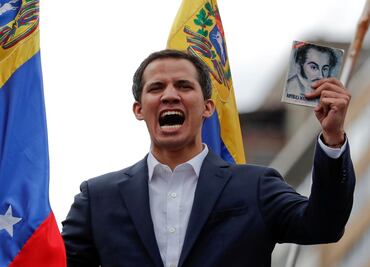 Buoyed by protesters, opposition leader Juan Guaidó claims Venezuela presidency