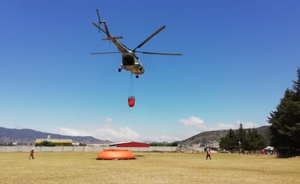 Autoridades federales y de Puebla combaten incendio forestal en Zautla