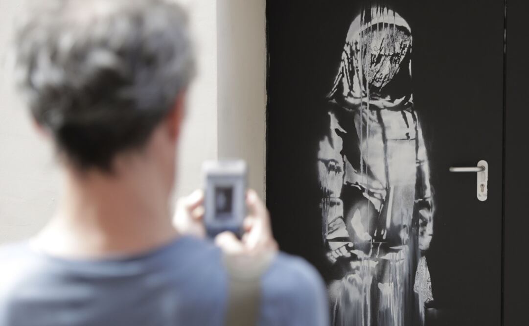 Banksy, cuya identidad mantiene en absoluto secreto, ha reivindicado la autoría en su cuenta oficial de Instagram. Foto: AFP/Thomas Samson