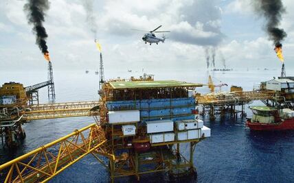 Oil prices inch up on Saudi commitment to cut output