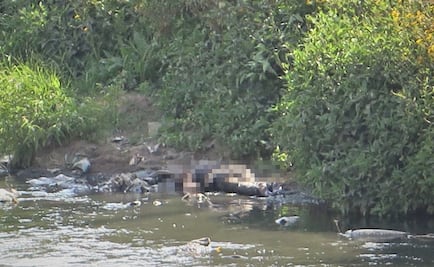 Hallan cadáver de mujer con signos de violencia en canal de Chimalhuacán
