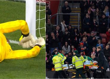 Łukasz Fabiański, portero del West Ham sale del campo; fue retirado en camilla tras una grave lesión