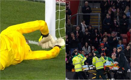 Łukasz Fabiański, portero del West Ham sale del campo; fue retirado en camilla tras una grave lesión