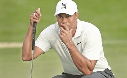 Woods se aferra con las garras