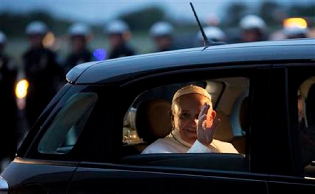 Pope Francis waves from his Fiat as he prepares to depart for Rome at Philadelphia International Airport in Philadelphia on Sunday, Sept. 27, 2015. (Photo: AP) 