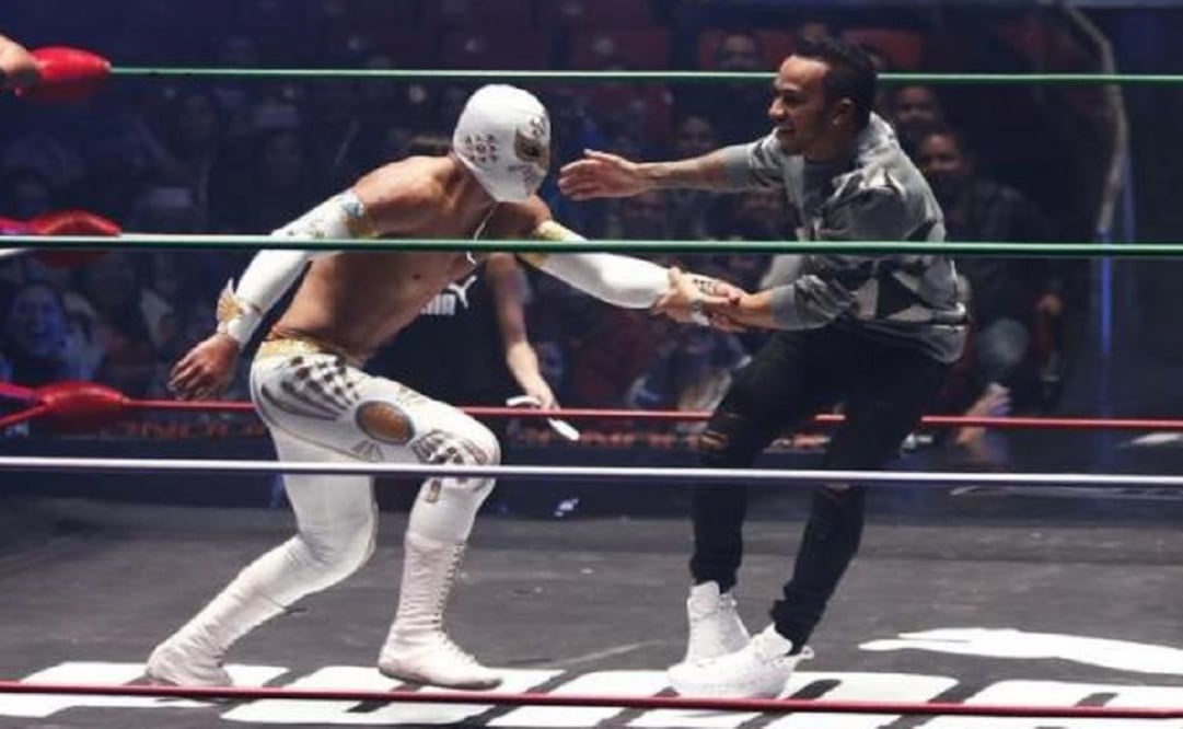 Lewis Hamilton performs with "Místico" at the Coliseo Arena during a promotional event in Mexico City on October 28, 2015. (Photo: Reuters)