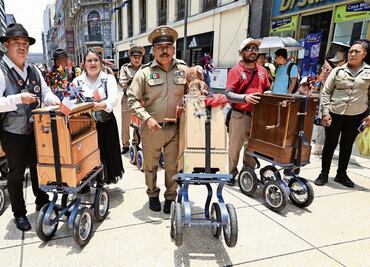 Crónica: Organilleros desfilan por las calles del Centro