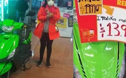 Mujer se encadena a motocicleta tras error de etiquetado; pide se la vendan en 14 pesos