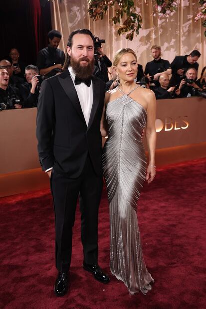 Danny Fujikawa y Kate Hudson. (Photo by Michael Tran / AFP) / -- IMAGE RESTRICTED TO EDITORIAL USE - STRICTLY NO COMMERCIAL USE --