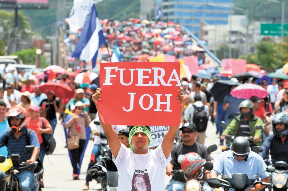 Exigen que dimita. Honduras ha sido sede de violentas marchas para exigir la renuncia de Juan O. Hernández. Foto: ORLANDO SIERRA. AFP