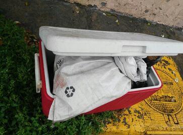 Abandonan hielera con restos humanos en Tlalnepantla