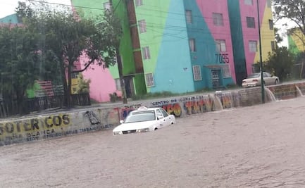 Tromba deja autos varados, viviendas inundadas y árboles caídos en Morelia