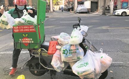 Escasean alimentos durante aislamiento en Shanghái