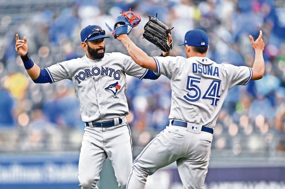 Roberto sacó los últimos tres outs para regocijo de Toronto (PETER AIKEN. USA TODAY SPORTS)