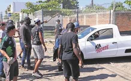 Dan a migrantes código QR para salir de Chiapas