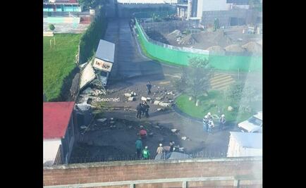 Cae barda de escuela sobre camión en Huixquilucan