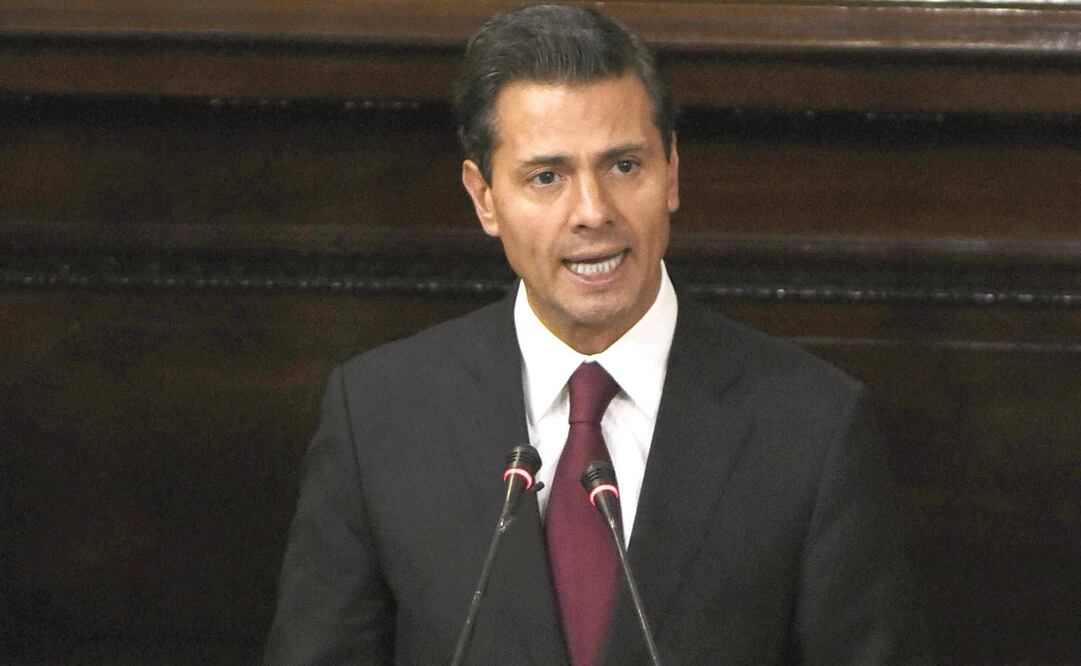 El presidente Enrique Peña Nieto reconoció en el Congreso de Guatemala que los guatemaltecos deben recibir en México un trato justo y digno (JOHAN ORDÓÑEZ. AFP)