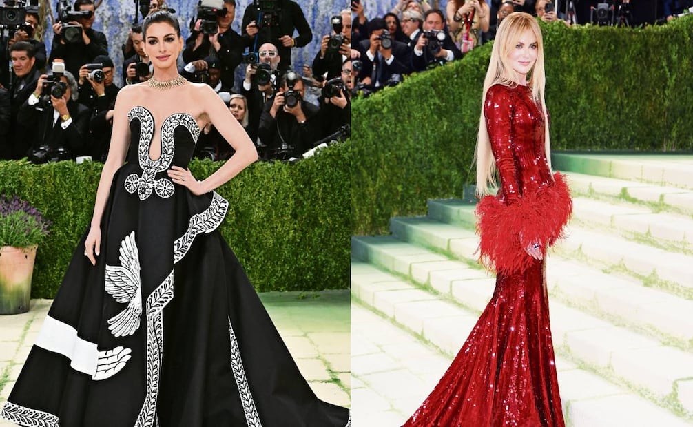 Anne Hathaway portó un vestido de seda mikado negra con una intervención de McGough, quien pintó una paloma, símbolo de la paz/Nicole Kidman se decantó por
un vestido de plumas de Channel. Foto: Agencias