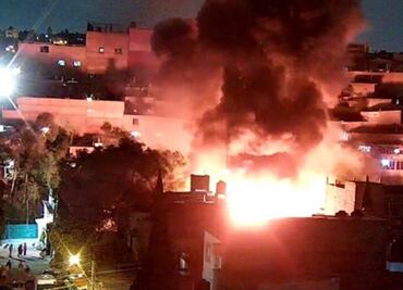 Incendio consume toneladas de plástico y madera en bodega de Atizapán