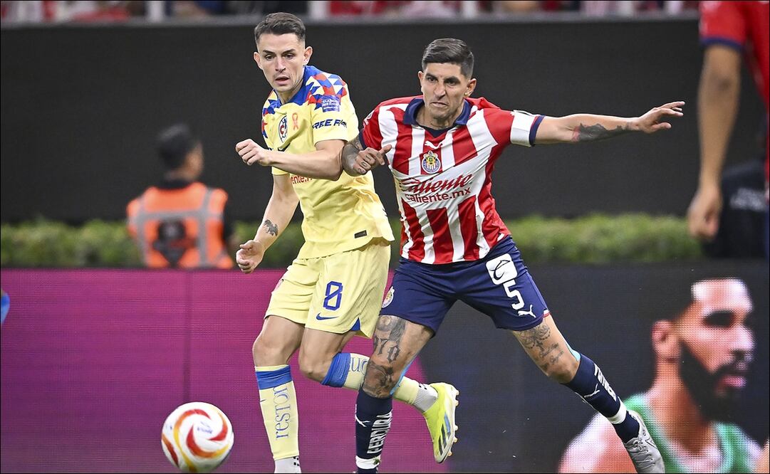 Álvaro Fidalgo y Pocho Guzmán en el Clásico de ida - Foto: Imago7