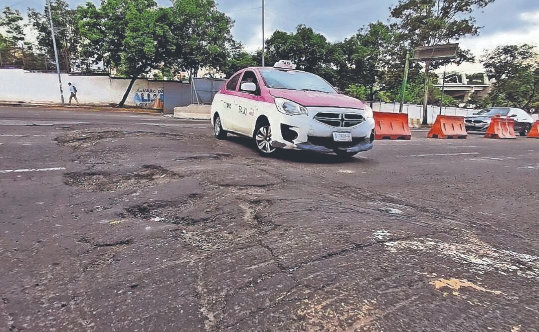 El problema de los baches en la Ciudad afecta a miles de personas, consideró Info-CDMX. Archivo El Universal