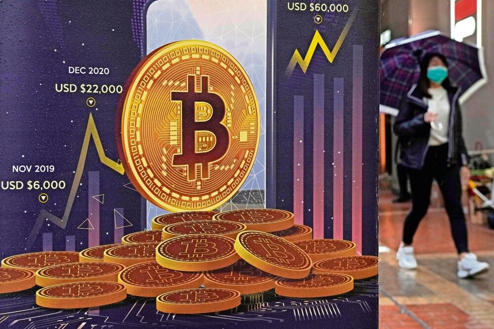 El bitcoin ha subido casi 80% desde el pasado 23 de enero. Foto: Kin Cheung | AP