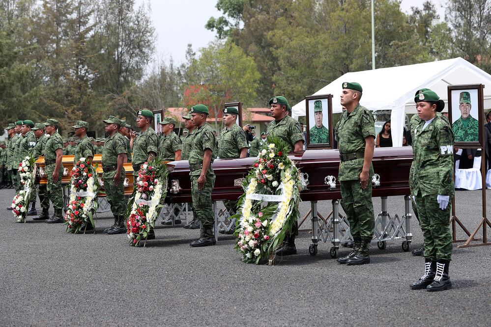 Ceremonia luctuosa por el deceso de 4 militares en el poblado de Palmarito, Puebla (ARIEL OJEDA. EL UNIVERSAL)
