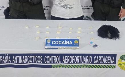 Incautan “narcopeluca” en aeropuerto de Cartagena; traficante escondía 19 cápsulas de droga en su cabeza