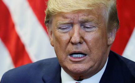 Wall Street cae por el comercio y posible juicio a Trump