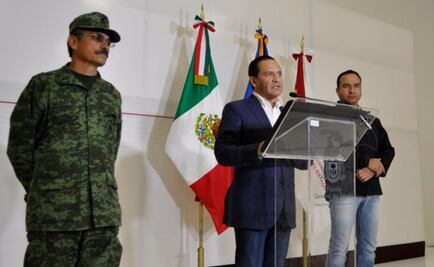 Detienen a 10 hombres con seis cadáveres