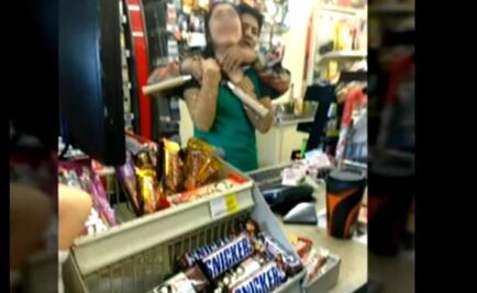 Toman rehén a empleada de 7 eleven