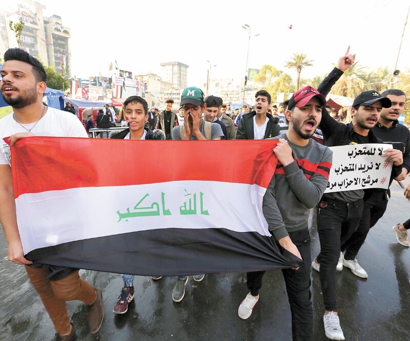 Manifestantes contra el gobierno, el 22 de diciembre, en Bagdad. AHMED JALIL. EFE