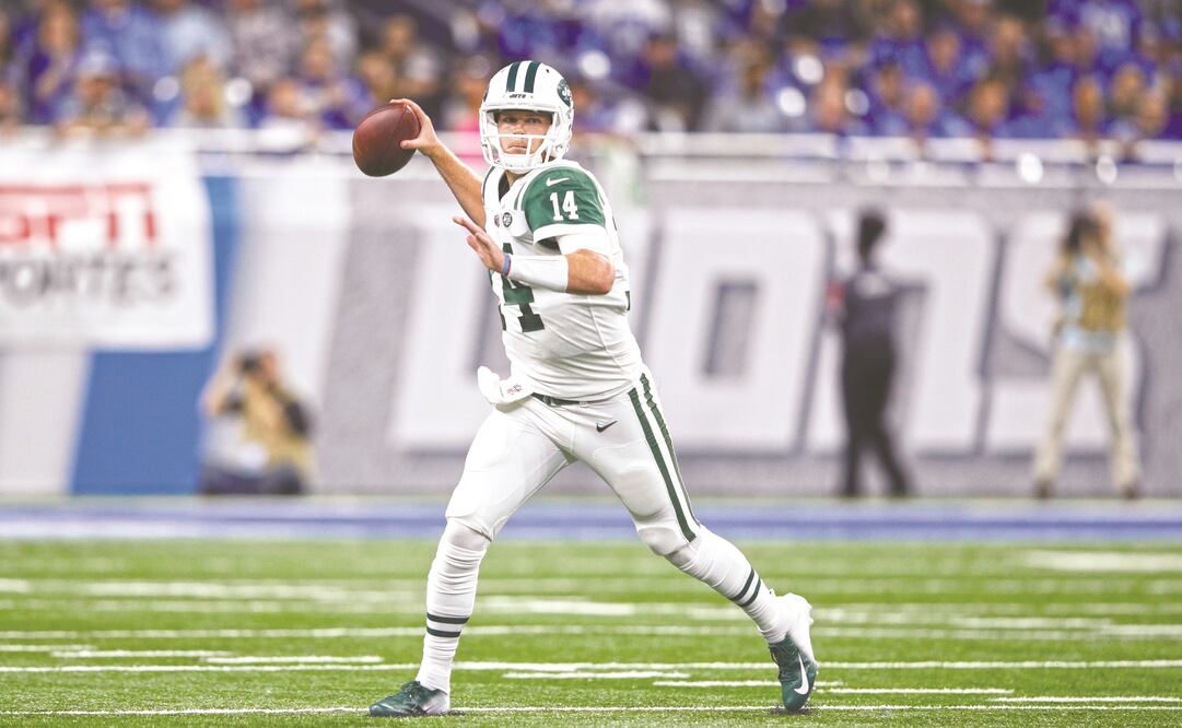 El quarterback de Nueva York tendrá cautela con sus rivales de hoy. (JOE ROBBINS. AFP)
