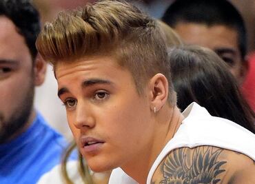 Advierten a Bieber sobre posar con ciertos felinos