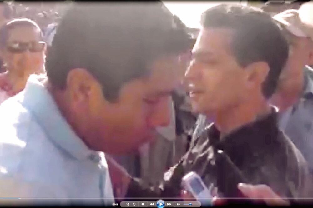 Al saludarse en Colima, el presidente Peña le dijo al ex candidato del PAN Jorge Luis Preciado (izq.) que en lo político él no se mete (HORACIO JIMÉNEZ. EL UNIVERSAL)