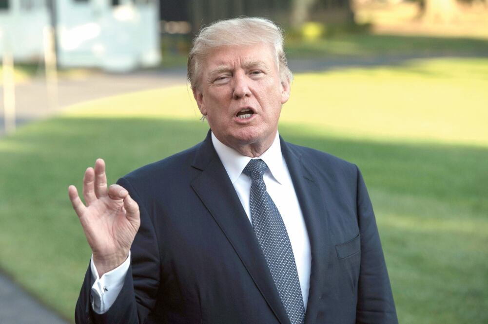 El presidente Donald Trump destacó que las nuevas medidas migratorias buscan bloquear la entrada de terroristas o amenazas de seguridad a EU (NICHOLAS KAMM. AFP)