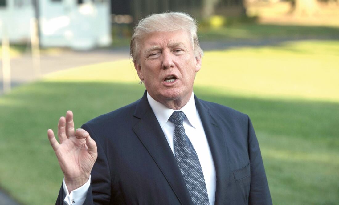 El presidente Donald Trump destacó que las nuevas medidas migratorias buscan bloquear la entrada de terroristas o amenazas de seguridad a EU (NICHOLAS KAMM. AFP)