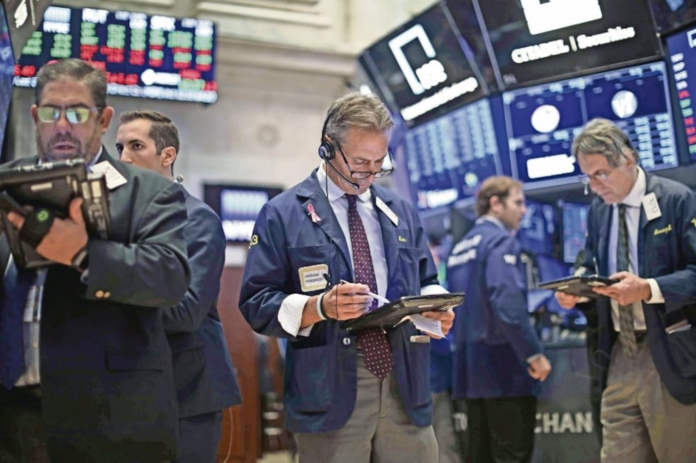 Re punte. El crecimiento de los beneficios de las compañías del S&P 500 en el tercer trimestre ha sido de 27.3%. Foto: DREW ANGERER. AFP