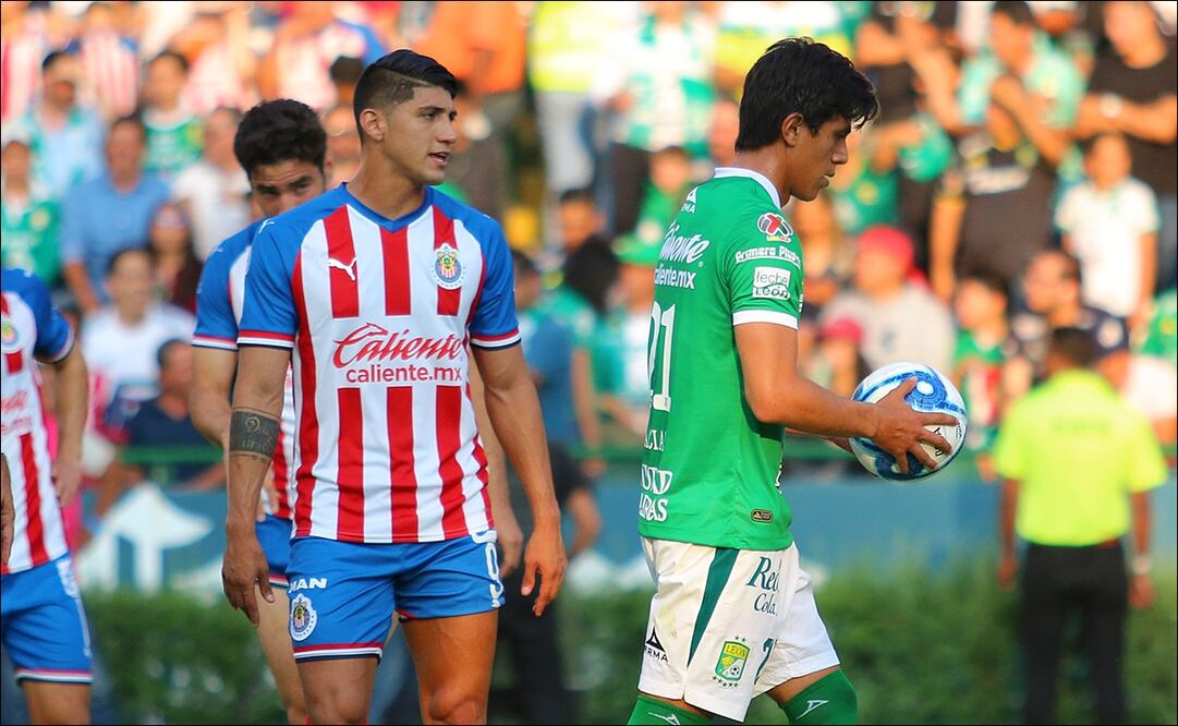 Alan Pulido y José Juan Macías. Foto: Imago 7