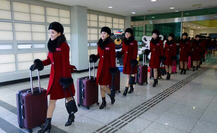 Animadoras norcoreanas cruzan la frontera para asistir a JO