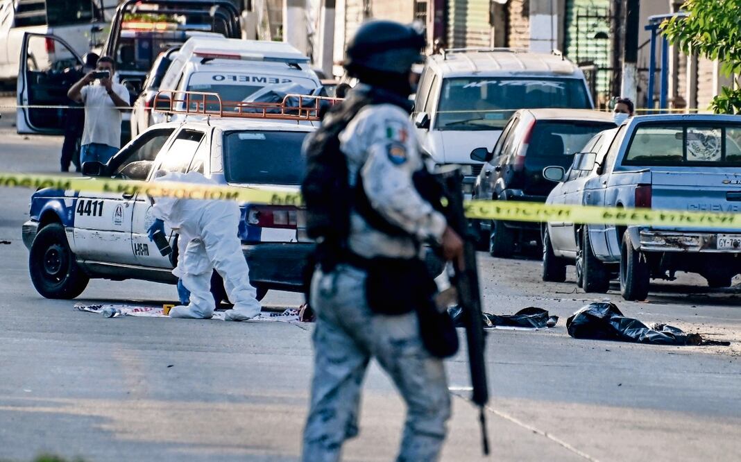 Varios cuerpos desmembrados fueron abandonados en taxis y bolsas de plástico Foto: Francisco RoblrdAFP