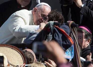 Pope cruises across Mexico City in tiny Fiat