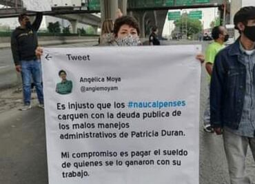 Extrabajadores municipales de Naucalpan bloquean Periférico Norte para exigir pago de salarios
