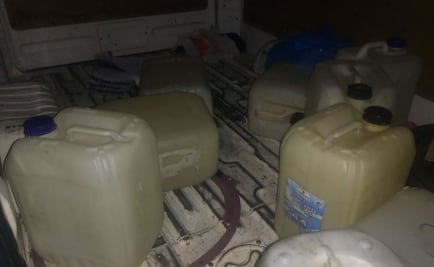 Detienen a dos hombres con 22 garrafones de gasolina en Atizapán