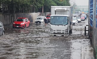 Encharcamientos afectan Gran Canal en GAM; lluvias dejan vehículos varados y complican la circulación
