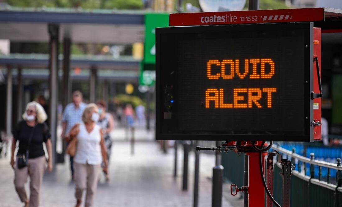 Alertan del Coivd-19 cerca de la Opera de Sídney, en Australia. Foto: Xinhua