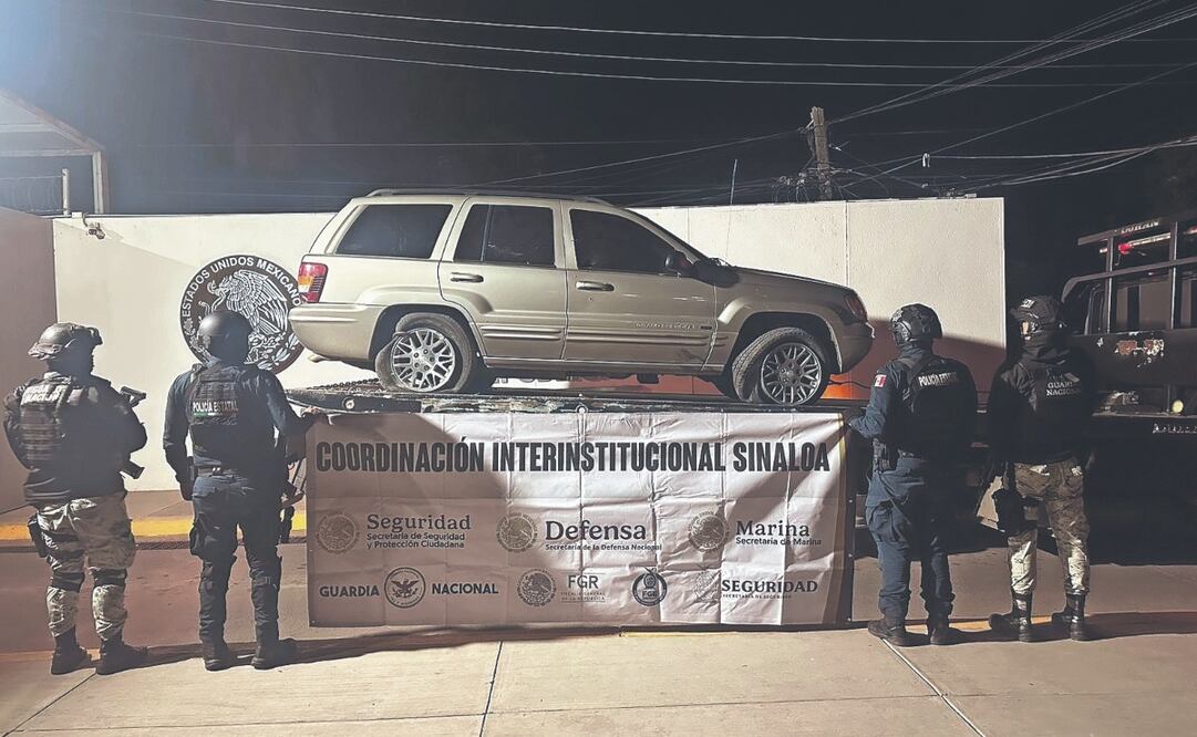 Elementos de seguridad resguardan el vehículo decomisado. Foto Especial